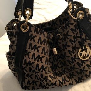 Michael Kors leather trim purse.